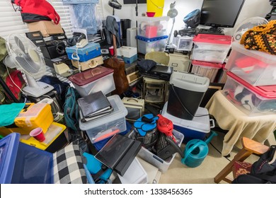 Hoarder Room Packed With Storage Boxes, Old Electronics, Files, Business Equipment And Household Items.