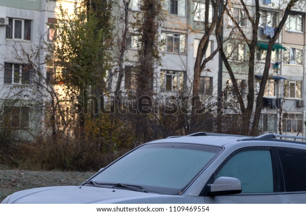 Hoarfrost covered the car. Autumn came to the\
city and made trouble for\
drivers.