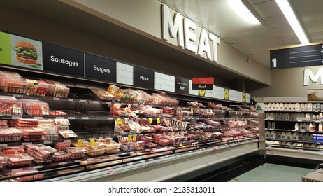 Hobart, Australia - Mar 2022: Various Type Of Fresh Raw Meat (chicken, Pork, Veal, Grass-fed Beef Mince) Display On The Refrigerator Shelf On The Woolworths Supermarkets And Grocery Stores.