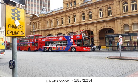 Hobart, Tasmania, Australia - April 2017: Tour Bus, Buildings, Street Signs In The Downtown