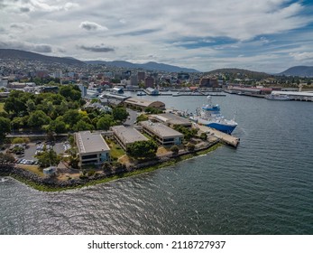 Hobart, Tasmania, Australia - January 3, 2022: High angle aerial drone view of CSIRO Marine Laboratories and RV Investigator, 94-metre ocean research vessel near Sullivan's Cove, Hobart's harbour.