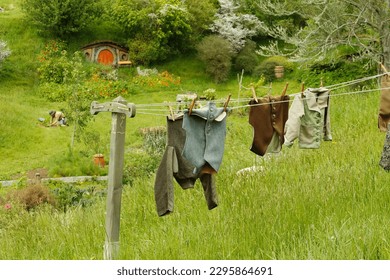 Hobbit clothes hang to dry in the green hills of the Shire