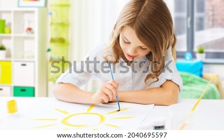 Image, Stock Photo Little girl painting a picture at home