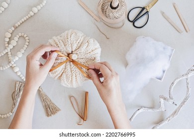 Hobby Background With Handmade Knit Pumpkins, Tools And Accessories. DIY, Craft Decoration For Fall And Winter Holidays. Flat Lay, Top View