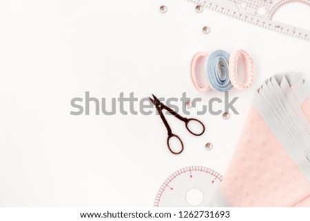 Hobby sewing with thread, scissors, fabric. Lifestyle. White background top view mock up