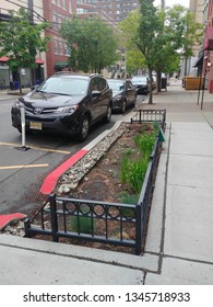 Hoboken, NJ - May 12 2018: A Bioswale On The Sidewalk On Park Avenue