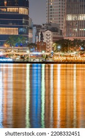 HOCHIMINH CITY, VIETNAM - February 22, 2022: View To District 1 At Night  View To City With Saigon Waterbus Wharf