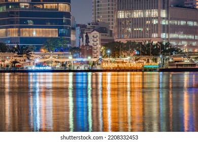 HOCHIMINH CITY, VIETNAM - February 22, 2022: View To District 1 At Night  View To City With Saigon Waterbus Wharf