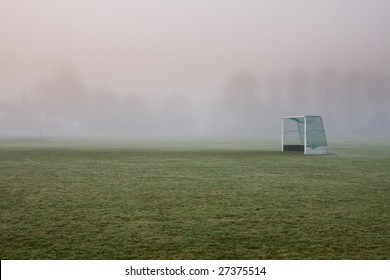 Hockey goal mouth on a misty dawn morning