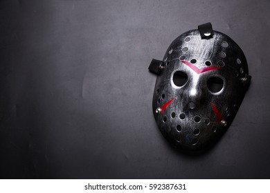 Hockey Mask Of Serial Killer Isolated On Black