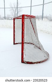 A Hockey Net In An Outdoor Arena.