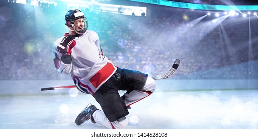 Hockey Player Celebrate Goal. He Very Happy Around Ice Rink Arena