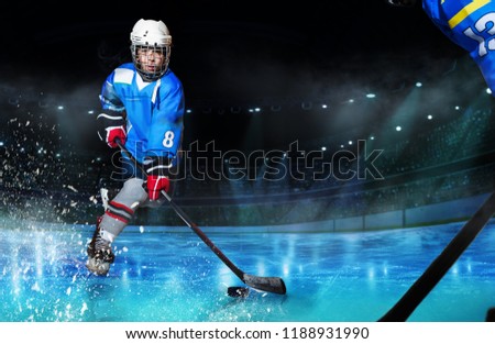 Hockey player passing the puck during competition