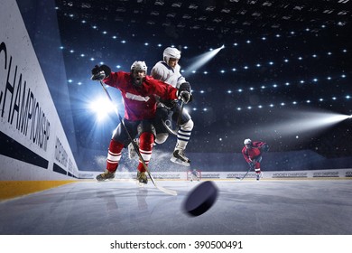 Hockey players shoots the puck and attacks