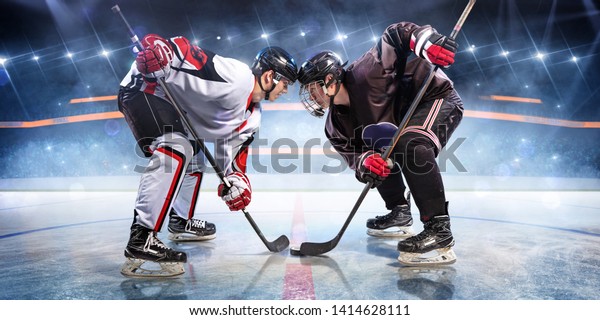 Hockey
players starts game. around Ice rink arena
