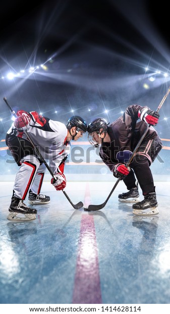 Hockey\
players starts game. around Ice rink arena\
