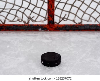 Hockey Puck In Net