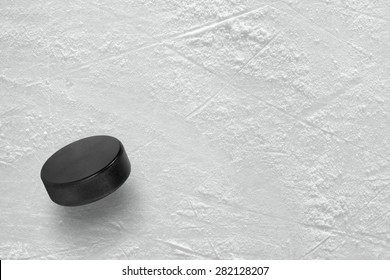 Hockey Puck On The Ice Arena. Texture, Background