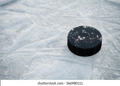 Hockey Puck On Ice Hockey Rink 