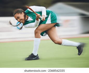 Hockey, sports or girl running in game, tournament or competition with ball, stick or action on turf. Blur, woman training or fast player in exercise, workout or motion on artificial grass for speed - Powered by Shutterstock