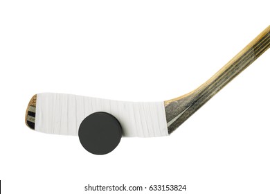 Hockey stick and puck isolated on white background