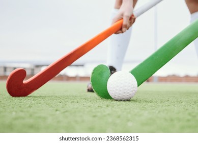 Hockey stick, sports or people on turf in a game, tournament or competition with ball or action. Fitness, athletes training or players in exercise, workout or closeup on artificial grass or ground - Powered by Shutterstock