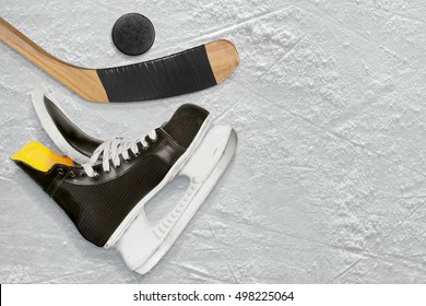 Hockey Sticks, Skate And Puck On The Ice. Texture, Background