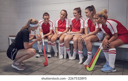 Hockey team talk, locker room and women with coach motivation for contest, sports or athlete team. Hockey player group, sport manager or game reflection for teamwork, development or collaboration - Powered by Shutterstock