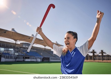 Hockey, winner and athlete woman in celebration after winning or scoring a goal at sports match or game on field. Fitness, win and young champion player happy about performance achievement in sport - Powered by Shutterstock