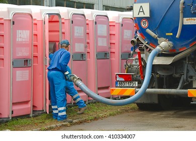 HODONIN, CZECH REPUBLIC - AUGUST 17: Cleaning of the mobile toilets at Made of Metal, August 17th 2014.