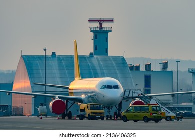 hoersching, austria, 16 march 2022, cargo aircraft opertaed by dhl at the airport of linz in the evening