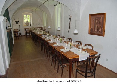 HOFAMT PRIEL, AUSTRIA - MAY 2016: Rottenhof Manor House Interior With Decorated Long Table For Wedding Feast Under Medieval Vault.