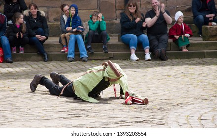 Hoghton, Lancashire/UK - May 5th 2019: The Mummers Play Performed In A Tudor Courtyard By A Street Theatre Group Of Amateur Actors With People Watching