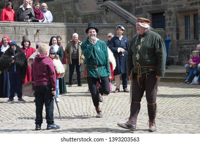 Hoghton, Lancashire/UK - May 5th 2019: The Mummers Play Performed In A Tudor Courtyard By A Street Theatre Group Of Amateur Actors With People Watching