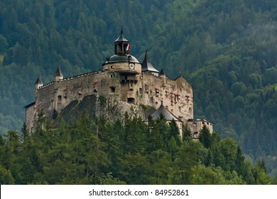 Hohenwerfen castle in Austria on Alps backgrond