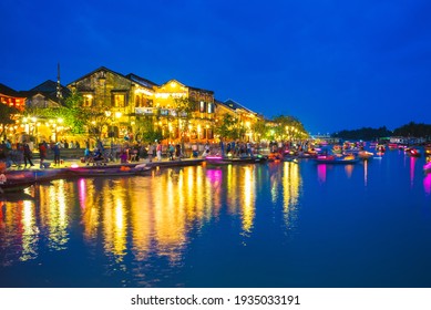 Hoi An ancient town by Thu Bon River in Vietnam at night - Powered by Shutterstock