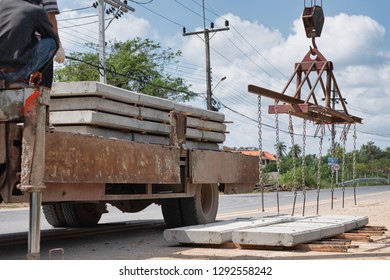 Hoisting Construction Works With Tower Crane Lifting Concrete Block, Plate, Slap, Floor Sheet, Surface.