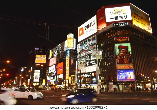 Hokkaido\
Japan March, 4 2019 : building and LED advertising  banner on\
Tanukikoji walking street in Supporo at\
night