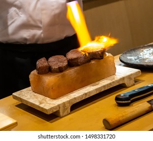 Hokkaido Kobe Beef Medallions Seared On A Salt Block, Omakase Style.