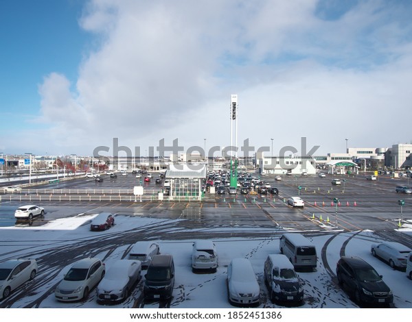 Hokkaido,Japan-November 11, 2020: New Chitose\
Airport Parking Lot in the\
snow\

