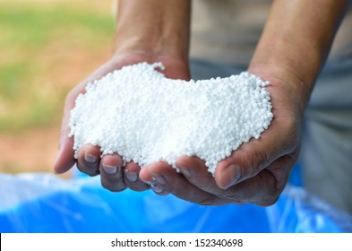 Hold Of Urea Chemical Fertilizer On Farmer Hand