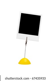 Holder With Instant Photo Isolated On A White Background.