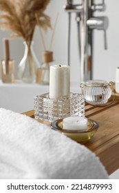 Holders With Candles On Wooden Bathtub Tray, Closeup