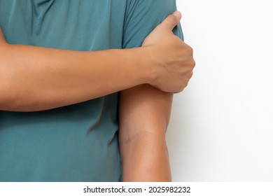 Holding Arm Man With Pain In Muscles And Joints,Symptoms Of Peripheral Neuropathy And Numbness In Muscles And Ligament,Diseases Caused By Side Effects Of Vaccination,Guillain Barre Syndrome(GBS) 