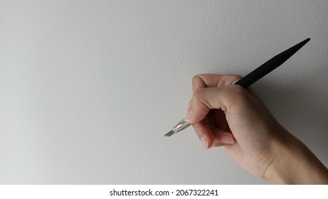 Holding Art Craft Knife With Hand