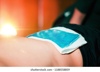 Holding The Blue Ice Pack N The Painful Lower Back.