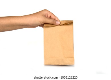 Holding brown paper bags on white background. - Shutterstock ID 1038126220