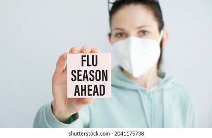 Holding A Card With Text Flu Season, Medical Concept