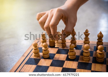 Similar – Image, Stock Photo Boy of primary school age plays chess