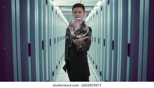 Holding digital globe, businessman in data center visualizing global network connections. Technology, connectivity, innovation, communication, cyber, networking